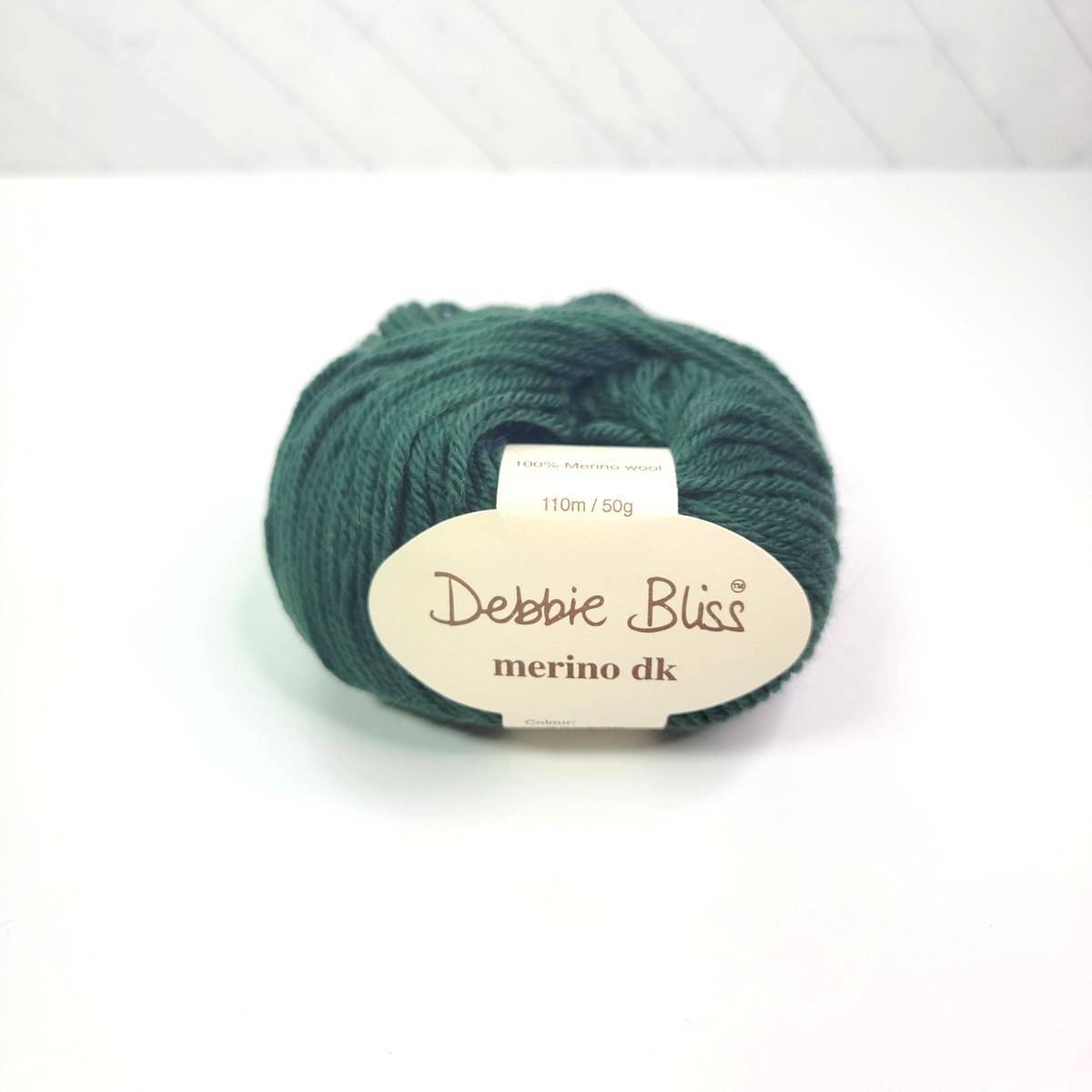 Debbie Bliss Merino DK in 225506 Dark Green - Image 1