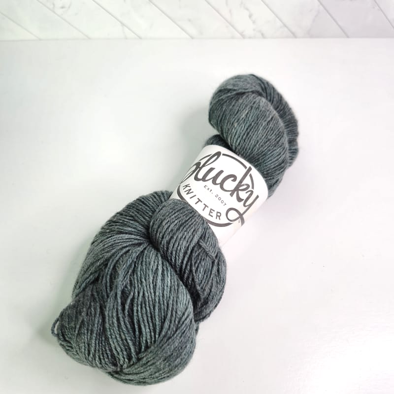 The Plucky Knitter Crewbie Fingering in Forward in Flats - Image 1